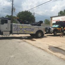 Fernandez &amp; Sons Wrecker Service logo