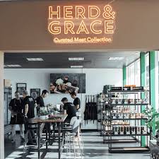 Herd &amp; Grace Steak Store logo